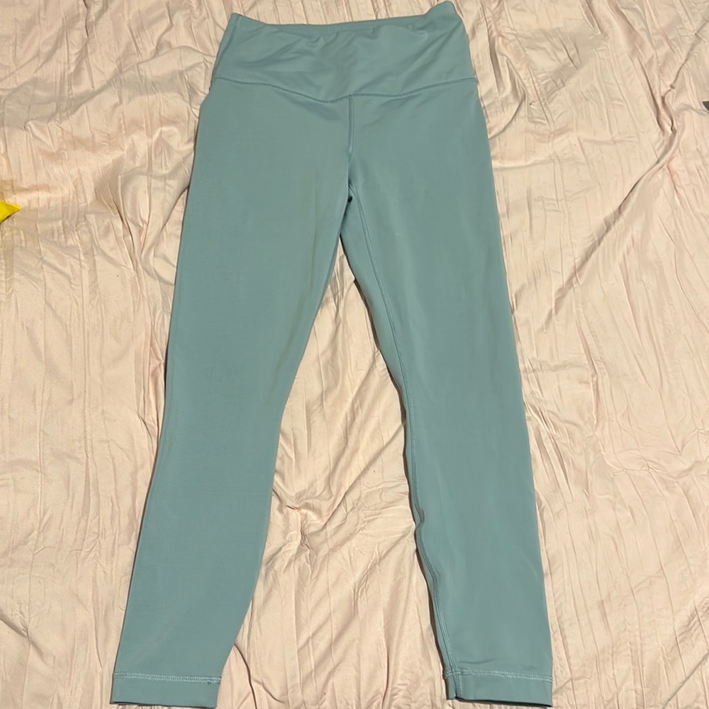 Barley worn 90 degree teal leggings